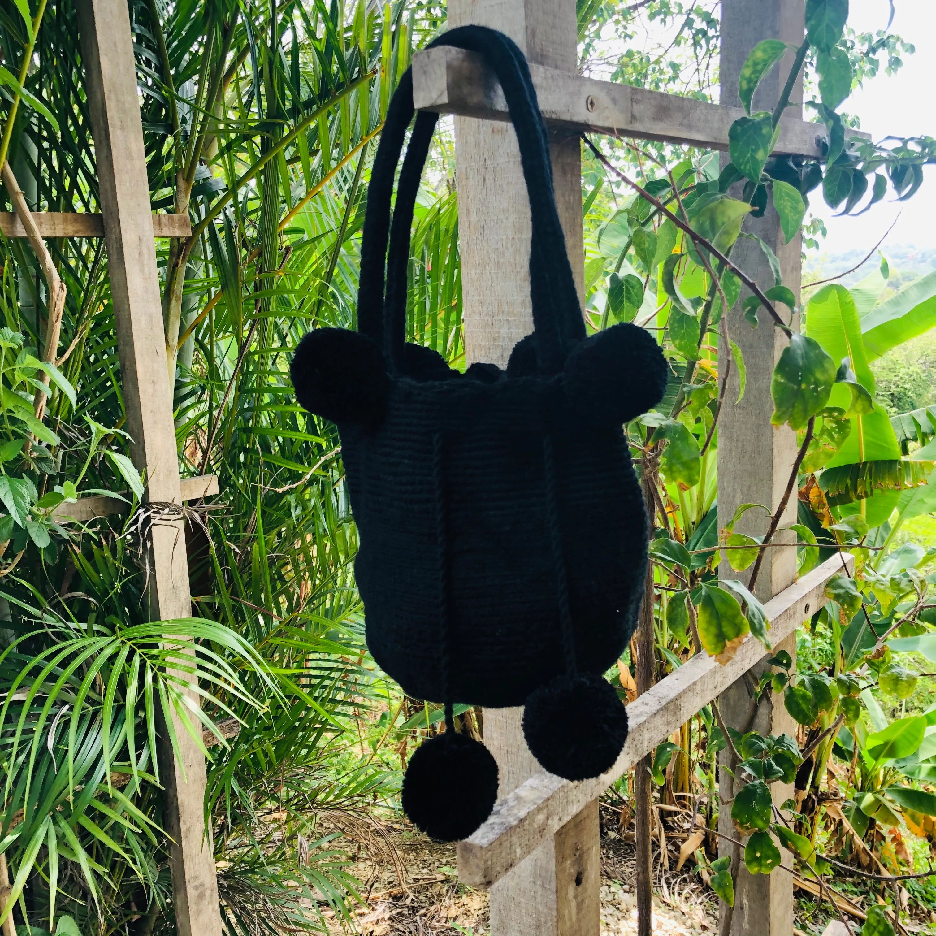 Small Black Pom Pom Mochila