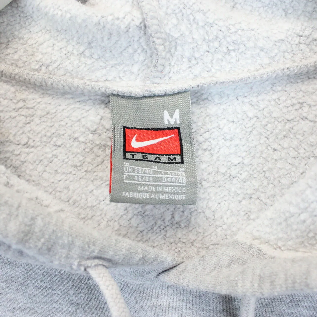 Vintage NIKE TEAM Hoodie Grey | Medium